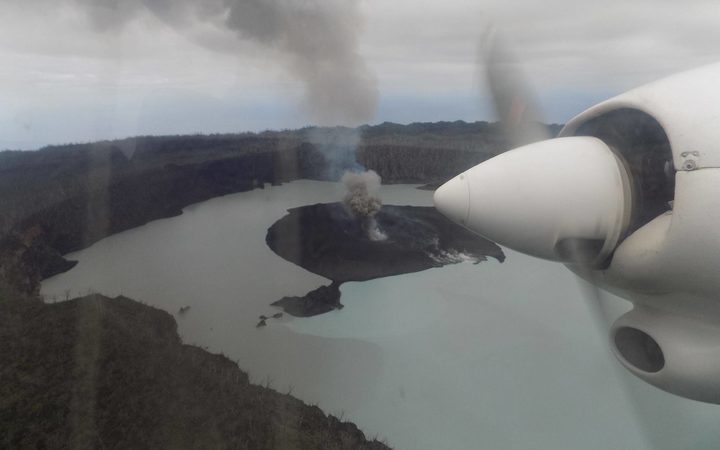 Click to enlarge An aerial image of the smoking volcano in the centre of Ambae, Vanuatu, that's forced the evacuation of some 5,000 people.