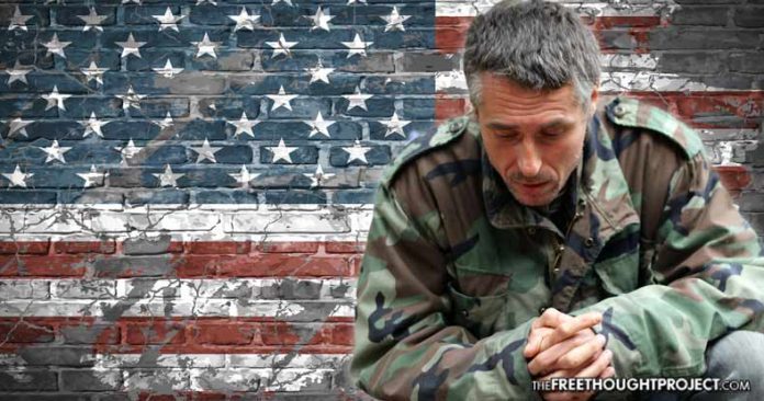 kneeling veteran