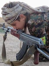 Click to enlarge Kurdish child soldier
