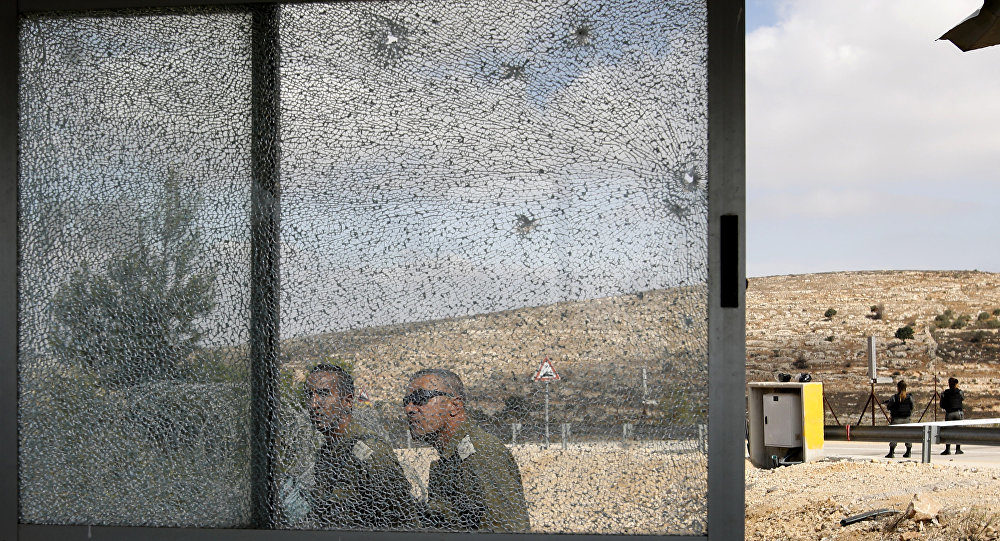 shattered window West bank