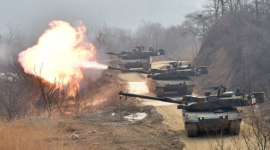 Click to enlarge South Korean army's K-2 tanks fire during a live-fire drill in Yangpyeong