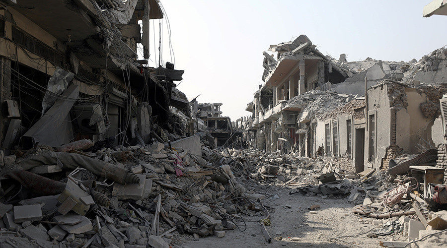 A view of a damaged site is seen in Raqqa