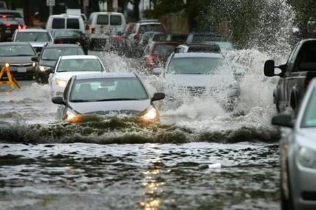 Cars slowly drove along Commercial Street in Lynn.