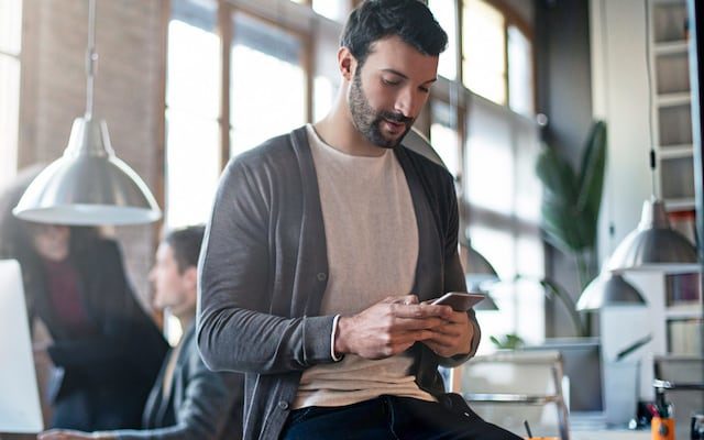 Man using smartphone app
