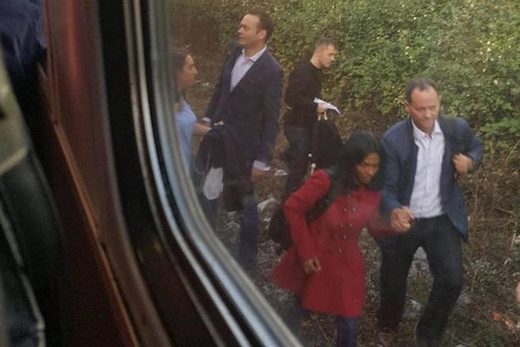 London train passengers panic and jump onto the tracks after 'doomsday nutter' starts reciting Bible verses