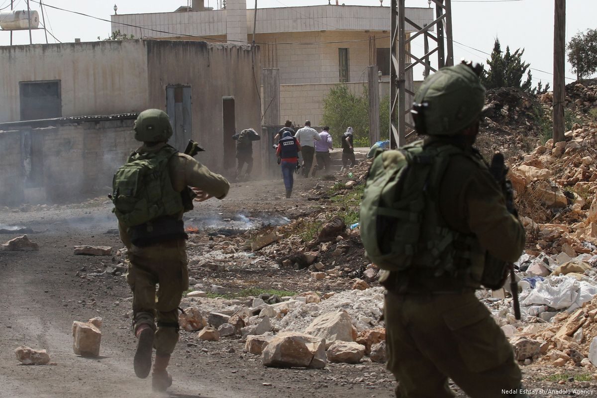 Israeli soldiers attack demonatration