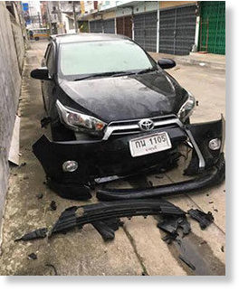 The car, parked near a dormitory in Muang district, Ratchaburi, that was savaged by marauding dogs.