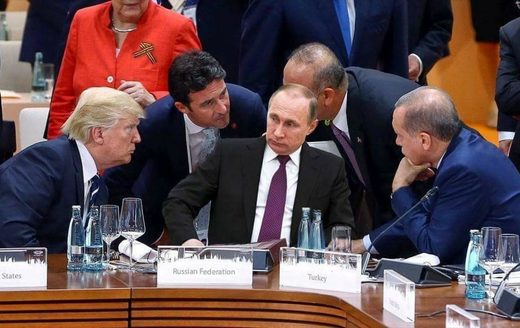 Click to enlarge Putin in the middle of attention