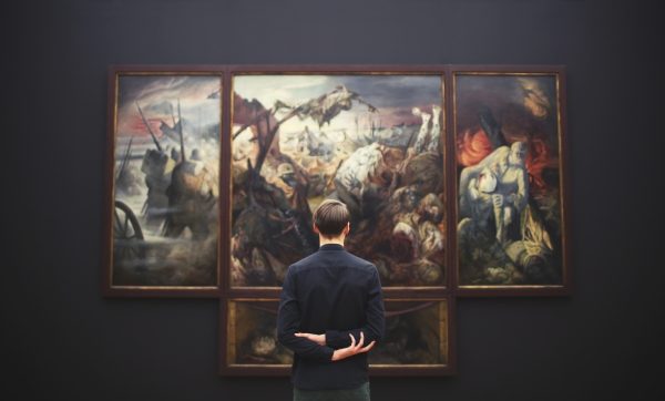 man in art gallery
