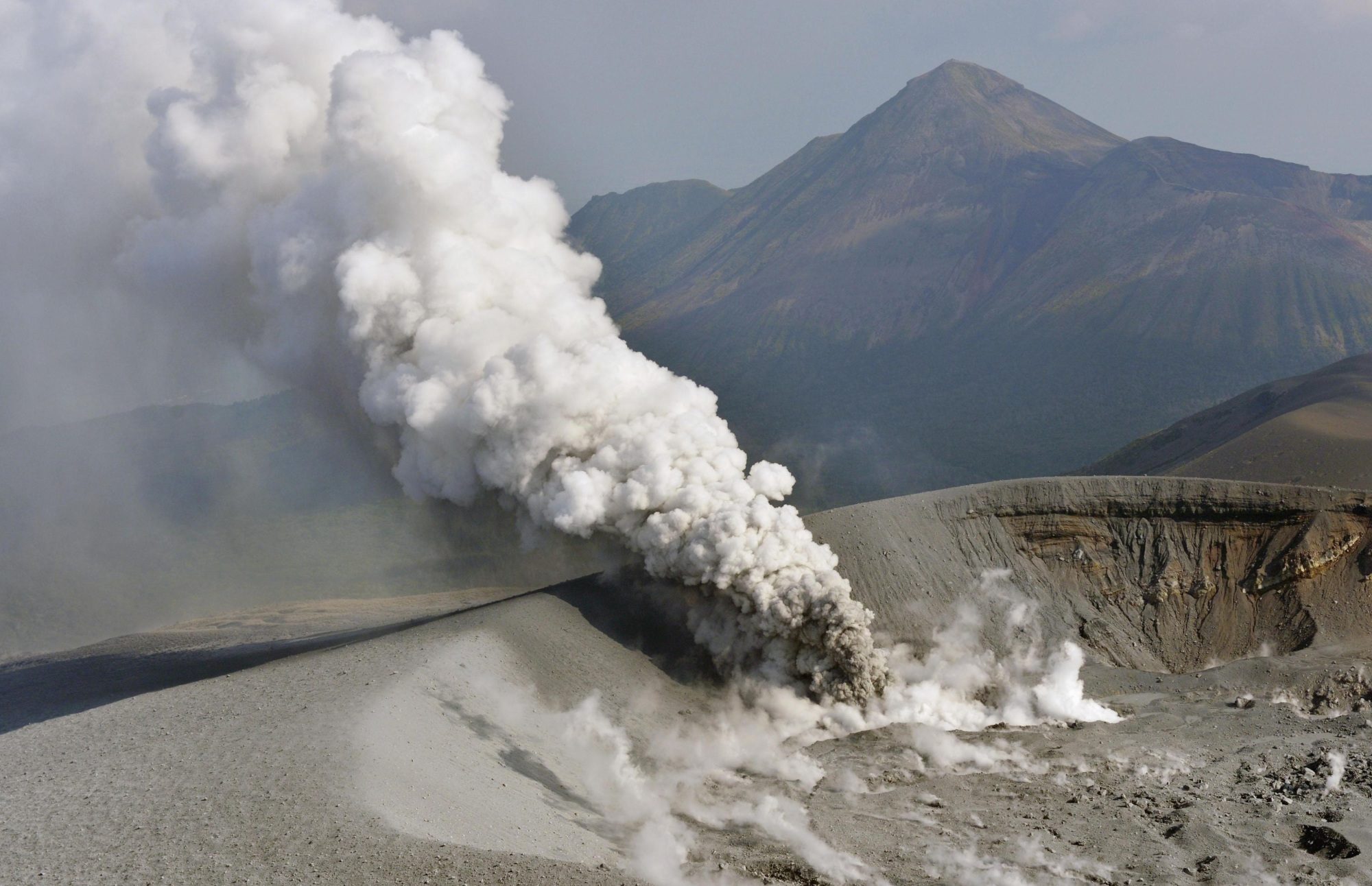 Aerial footage shows the increasingly active volcano Mount Shinmoe smoking on Wednesday afternoon.