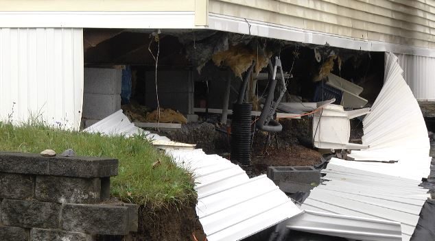 Click to enlarge Watertown sinkhole home damage