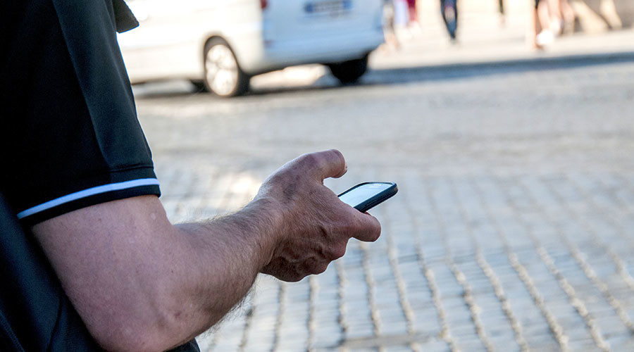 man texting cell phone