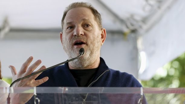 Click to enlarge Harvey Weinstein speaking mic