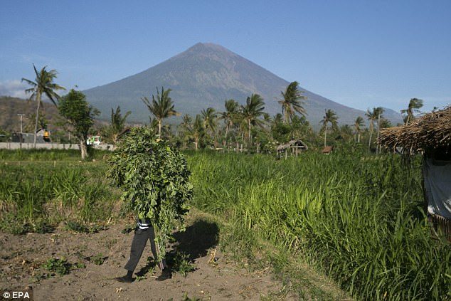 Click to enlarge There are fresh fears that Bali's Mount Agung (pictured) could erupt after the volcano reached peak earthquake activity, with thousands of tremors a day