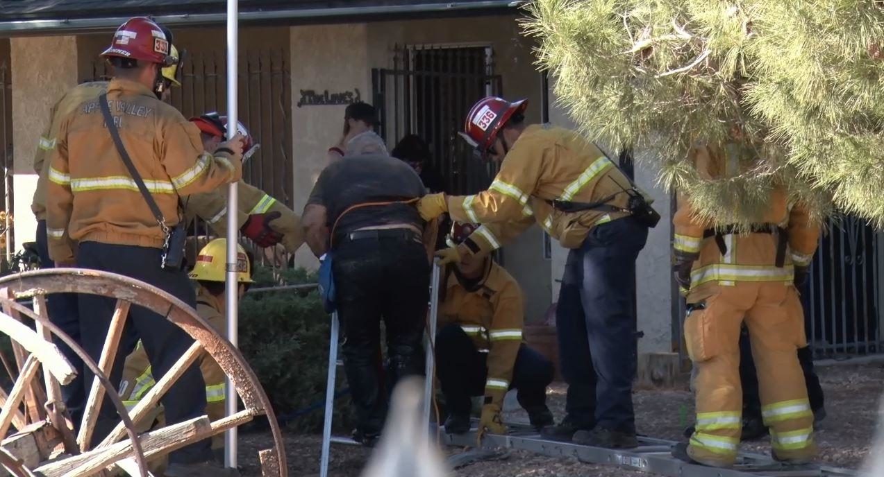 Authorities, neighbors help rescue 75-year-old man from sinkhole in Apple Valley