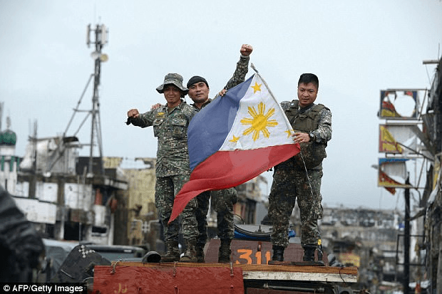 Click to enlarge Victorious troops paraded in Philippine