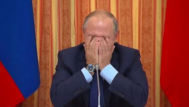 Click to enlarge Putin laughing
