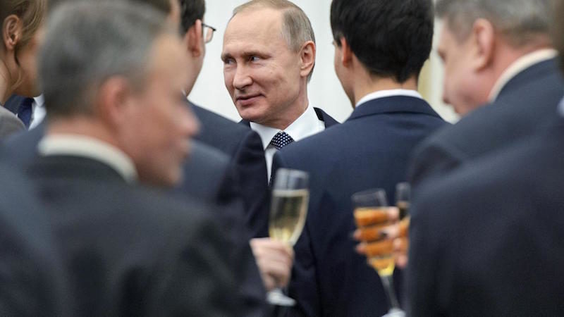 Putin and winners of a prize for young scientists.