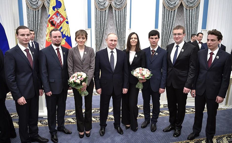 Click to enlarge Putin with winners of Presidential prizes