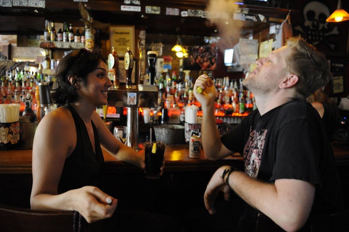 Click to enlarge E-cigarettes in NY bar