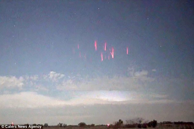 The extraordinary weather occurrence appears as jellyfish-shaped clusters of bright red light, and is caused by electrical bursts of light above highly active thunderstorms