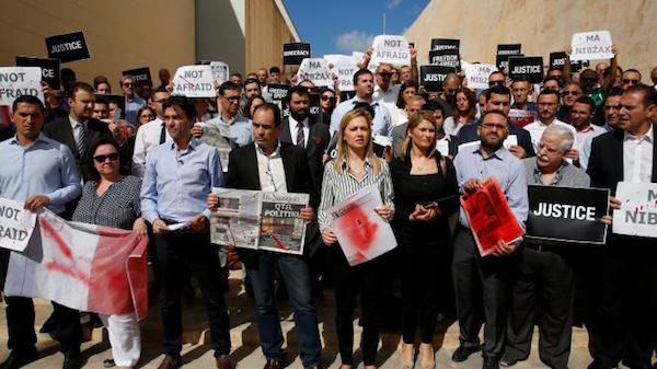 Click to enlarge Journalists protested