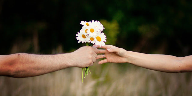 giving flowers