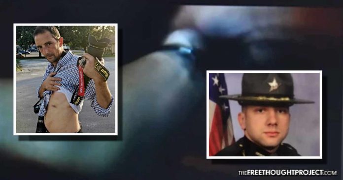 cop shoots journalist