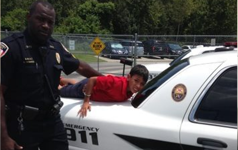 handcuffed boy
