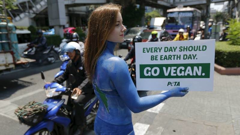 Click to enlarge vegan protester