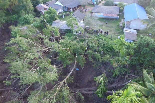 An aerial view shows connected sinkholes within a few metres of the Banbonkaokangriang School grounds in Sri Sawat district of Kanchanaburi on Saturday