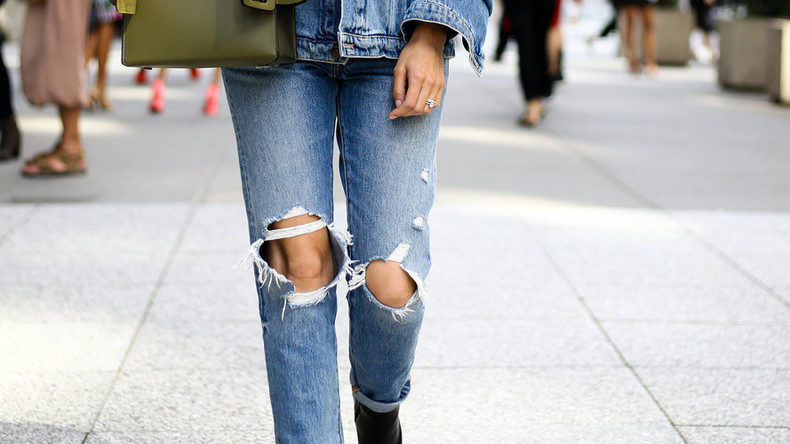 Person with ripped jeans