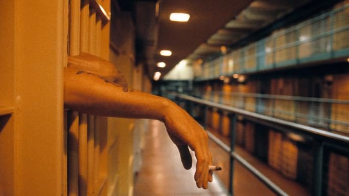 Click to enlarge Prisoner smoking