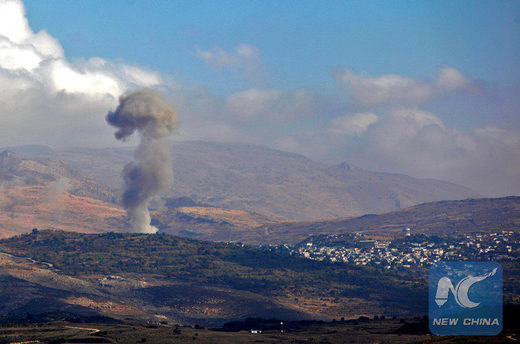 Smokes billows from the southern Syrian Druze village of Hadar on November 3, 2017 as seen from the Israeli-annexed Golan Heights.