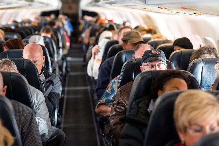 Click to enlarge passengers on plane