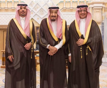 Click to enlarge Saudi King Salman bin Abdulaziz Al Saud poses for a photo with National Guard Minister Khaled bin Ayyaf and Economy Minister Mohammed al-Tuwaijri during a swearing-in ceremony in Riyadh, Saudi Arabia, November 6, 2017.