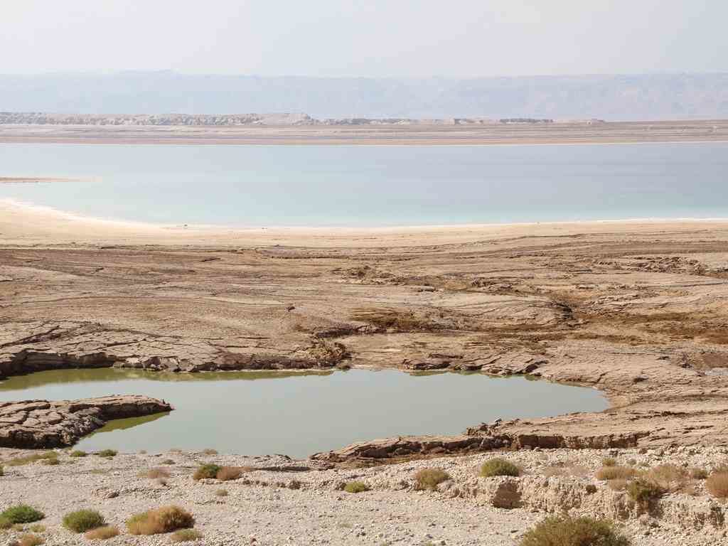 A large sinkhole on the shore of the Dead Sea. Its one of 300 sinkholes that have formed since the early 2000s within a 6 kilometre stretch.