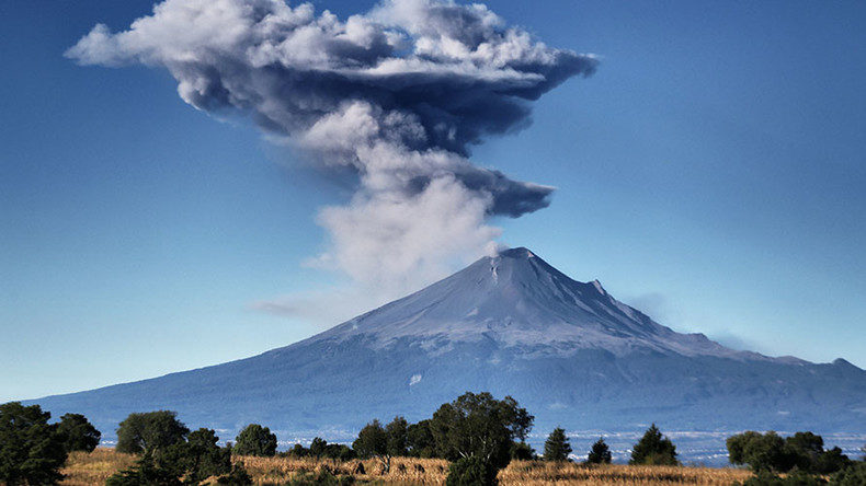 Click to enlarge A huge plume of smoke rises into the air following the eruption of Mexico's Popocatepetl