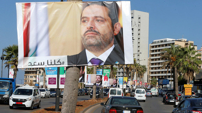Posters depicting Lebanon's Prime Minister Saad al-Hariri are seen in Beirut