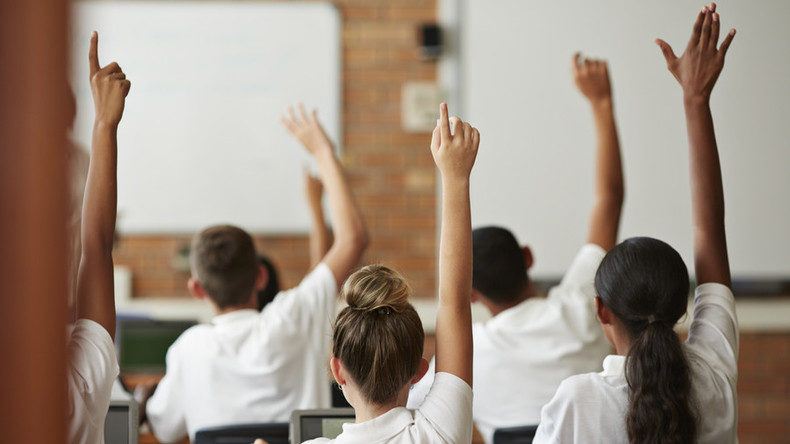 Click to enlarge students in class
