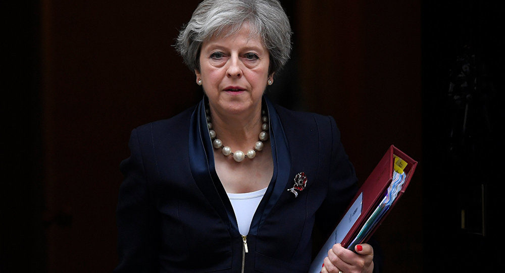 Click to enlarge Theresa May