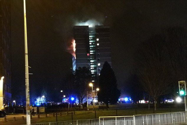 Photographs posted online showed smoke and flames coming from the Coolmoyne House tower block in Dunmurry, in the west of the capital