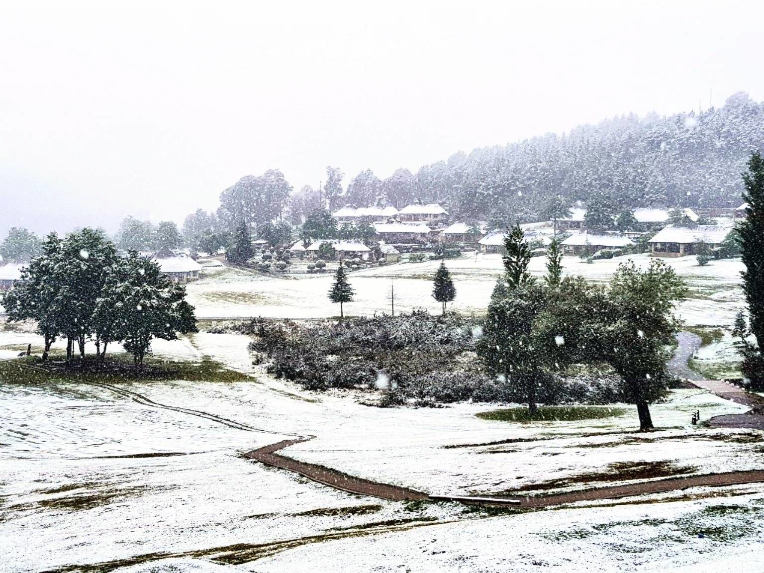 A light snowfall dusts the Fairways at the Drakensberg Gardens resort in the southern Berg