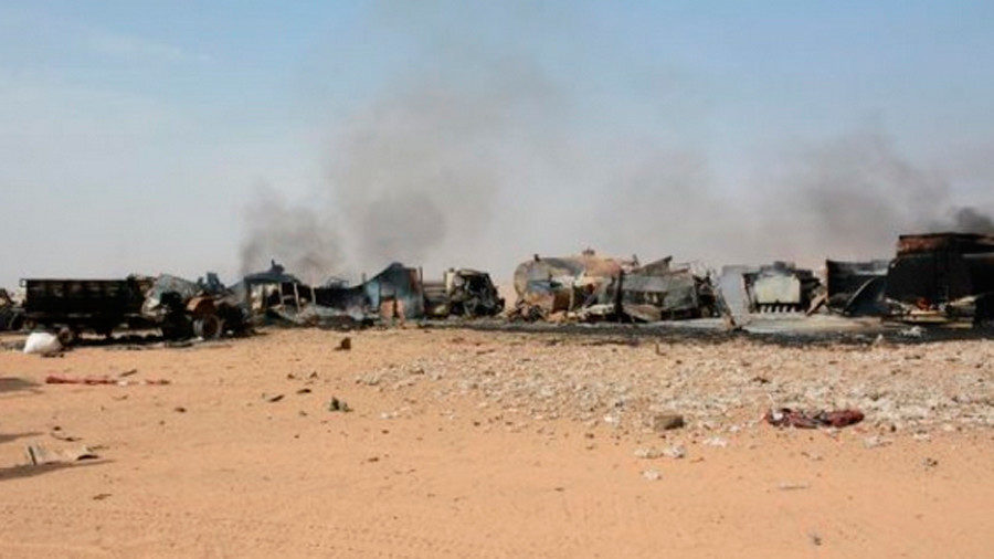 Smoke rises at site for displaced families in eastern Syria