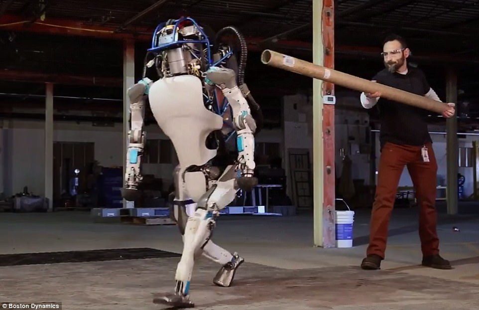 Click to enlarge robot and trainer