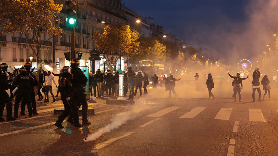 French police use tear gas to disperse protest against slave auctions in Libya (VIDEO) Demonstrators taking part in a march against 