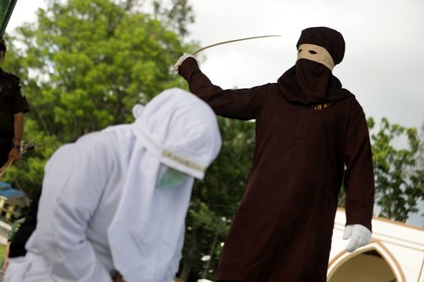 woman getting caned sharia law