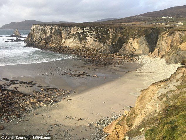 Islanders are celebrating after the beautiful beach at Ashleam Bay (pictured), which 'vanished' 12 years ago, suddenly reappeared overnight