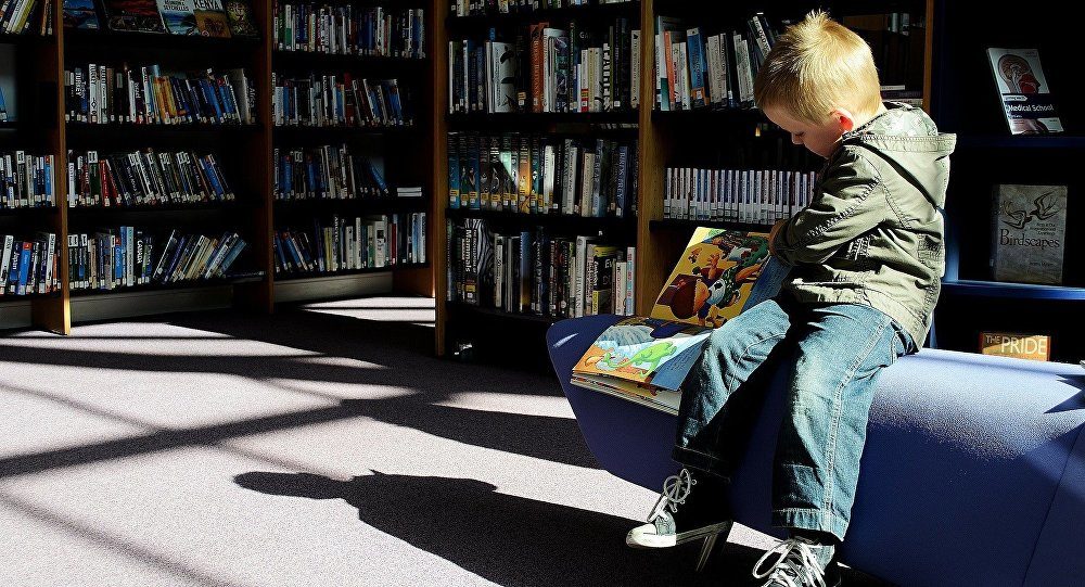 child reading book