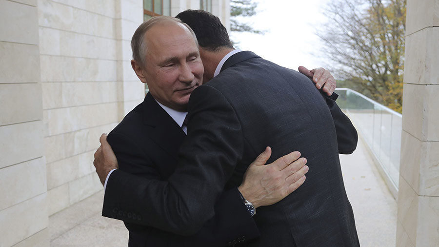 Click to enlarge Assad Putin